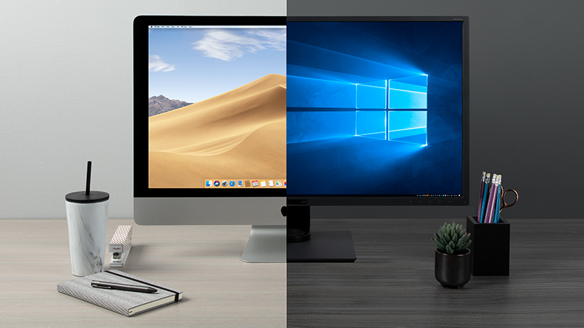 Windows and Mac operating systems on two monitors